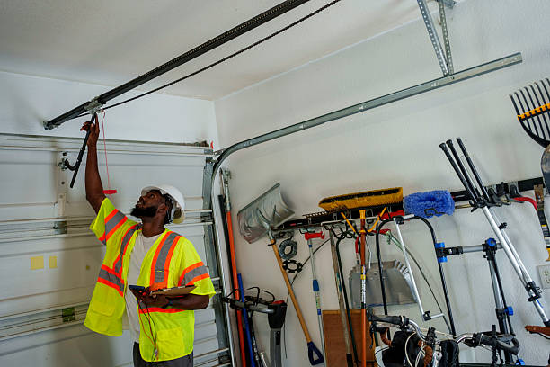 Professional Garage Door Panel Replacement technician working in Bozeman, MT